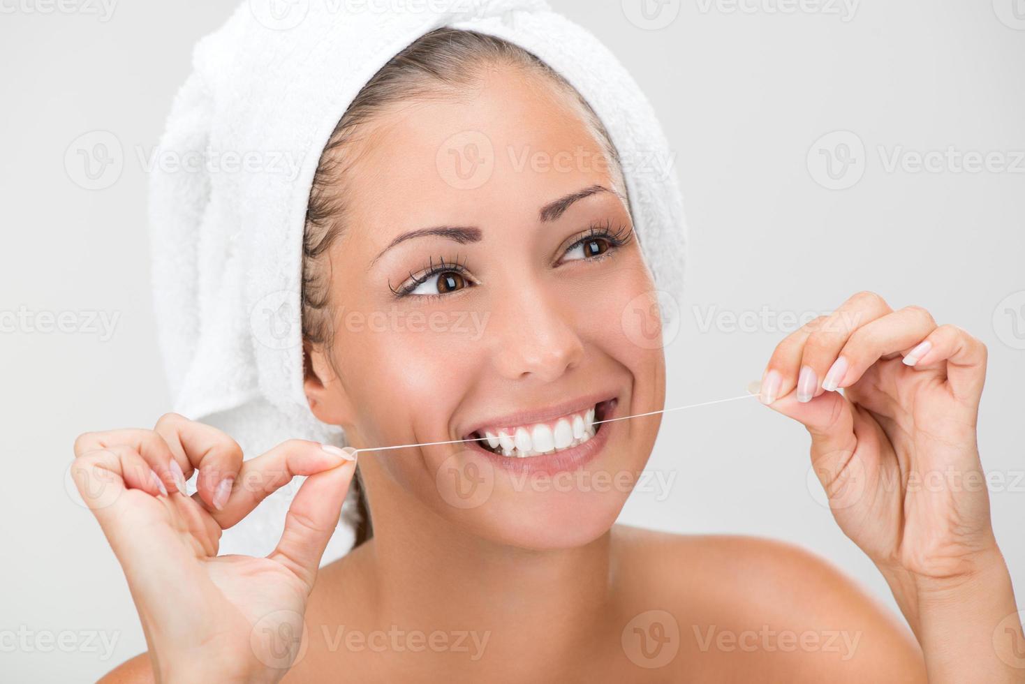 Cleaning Teeth With Dental Floss 14157438 Stock Photo at Vecteezy