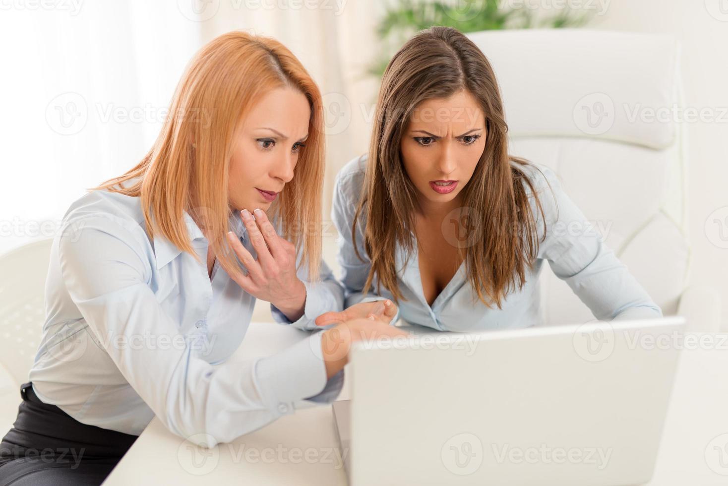 Female Colleagues In The Office photo