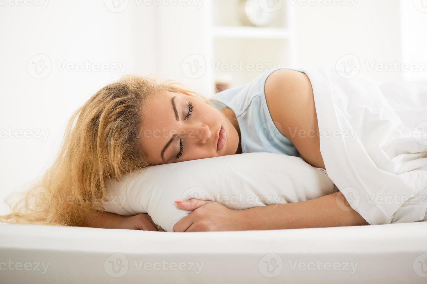 Young woman sleeping photo