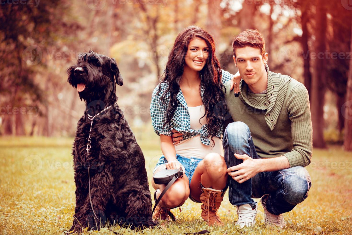 Young Couple With Schnauzer photo