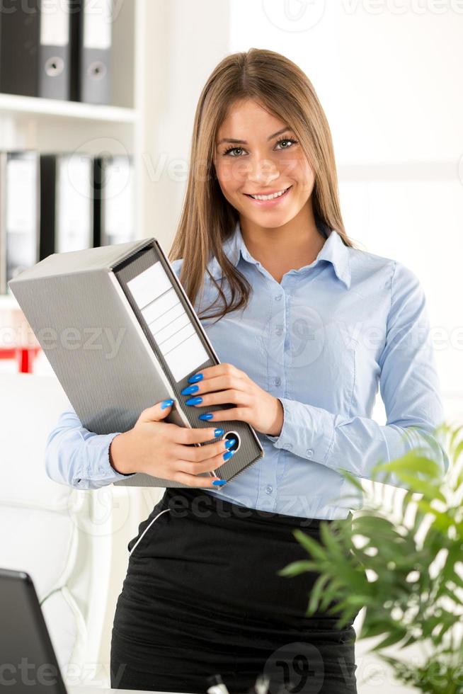 Young Businesswoman With Binder photo