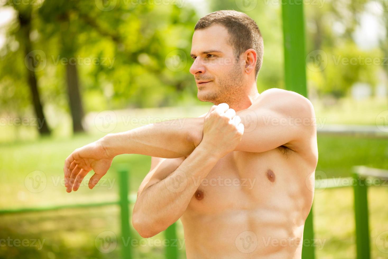 Man Stretching In The Park photo