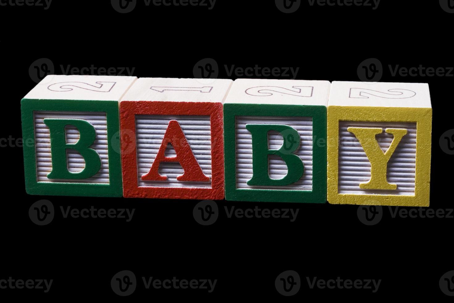 abc blocks on a  black background photo