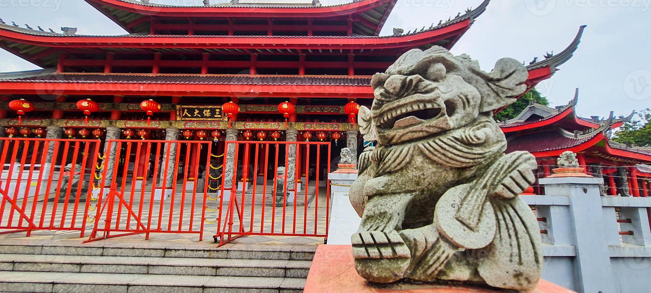 A photo of a small dragon statue made of stone at the Sam Poo Kong Temple Semarang.