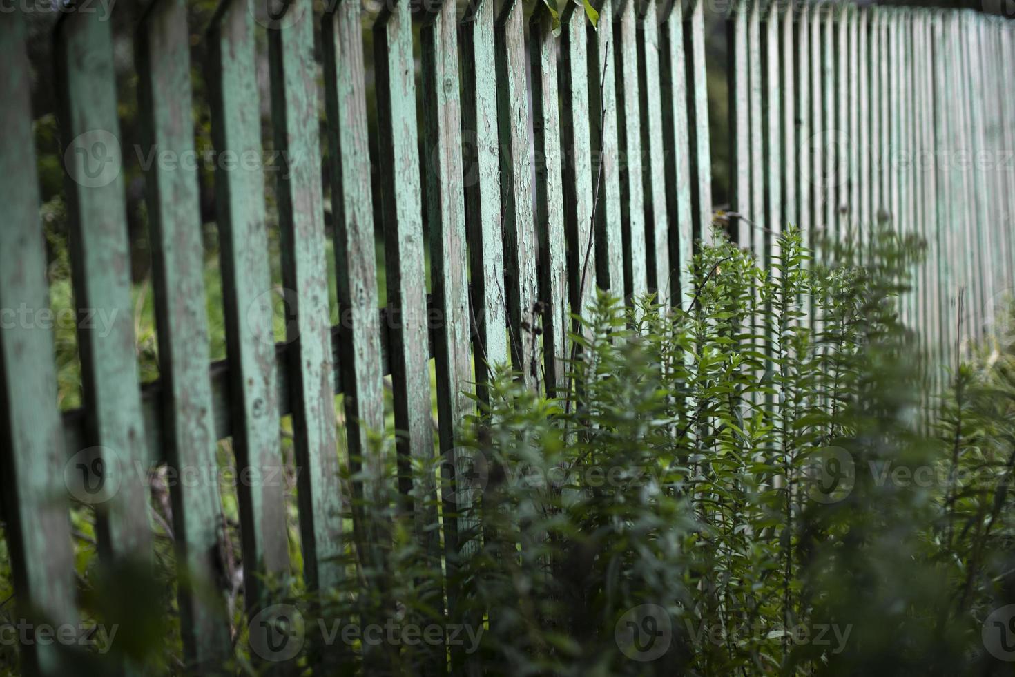 Fence made of wood. Village fence. Thing made of wood. photo