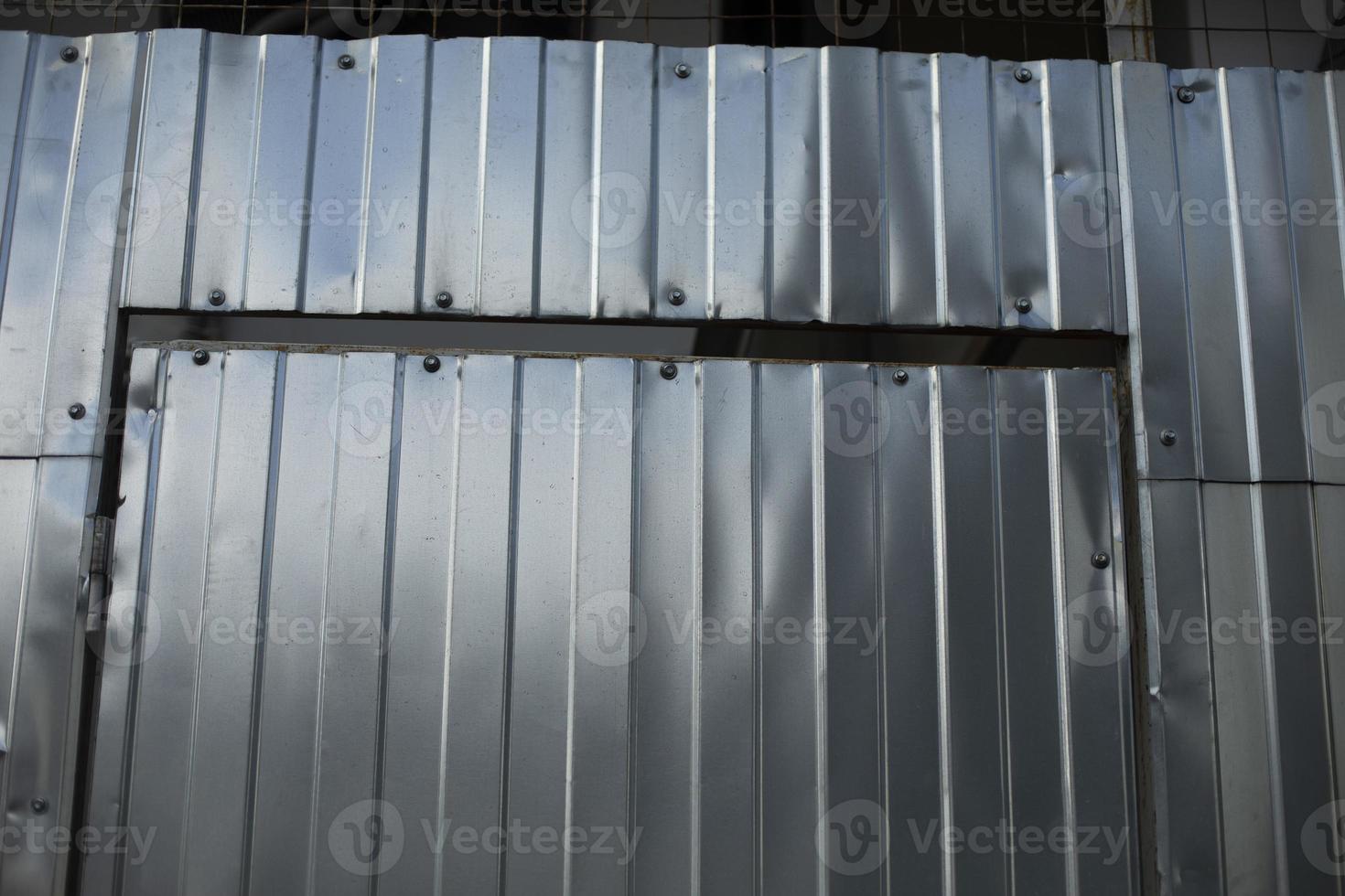 Steel fence in detail. Fence made of metal profile. Durable material to protect against prying eyes. photo