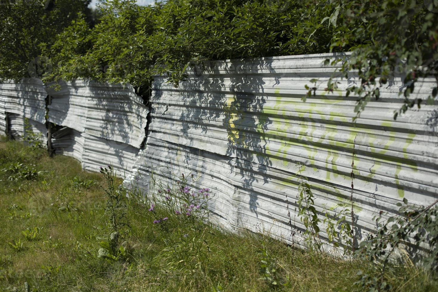 Steel fence in detail. Fence made of metal profile. Durable material to protect against prying eyes. photo