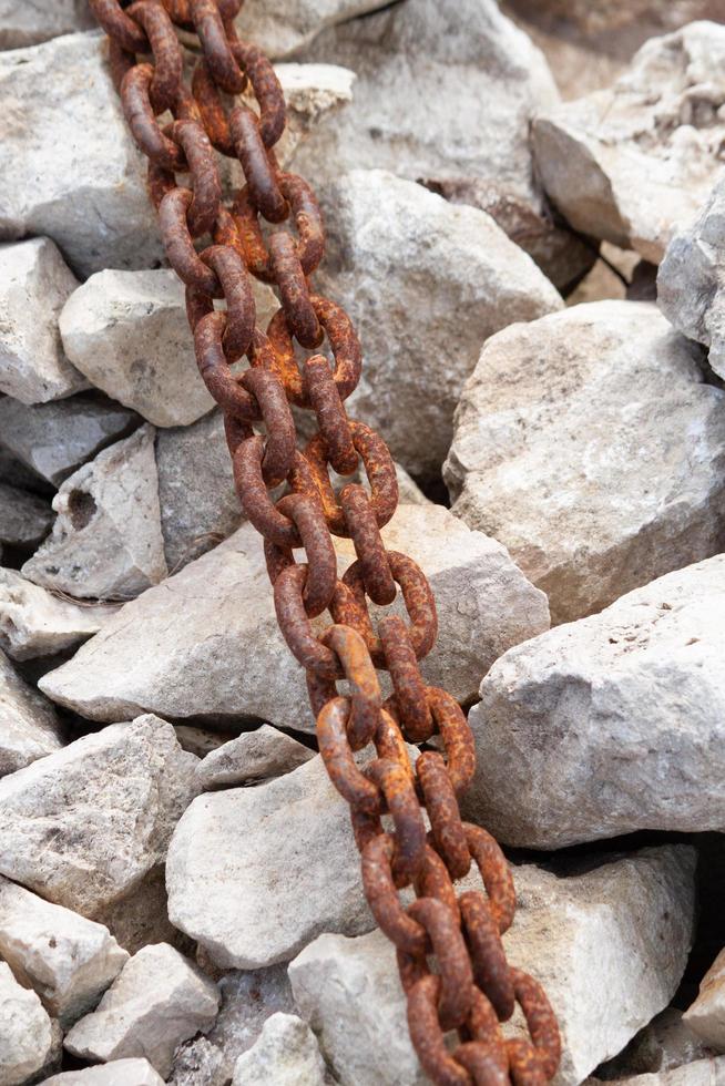 Rusty anchor chain vertical background. photo