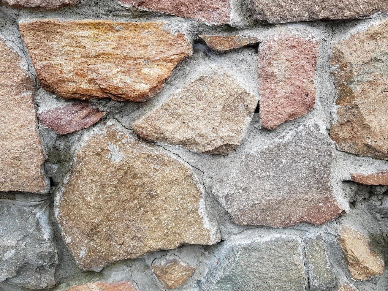 Old stone wall. Rough texture. Place for text. photo