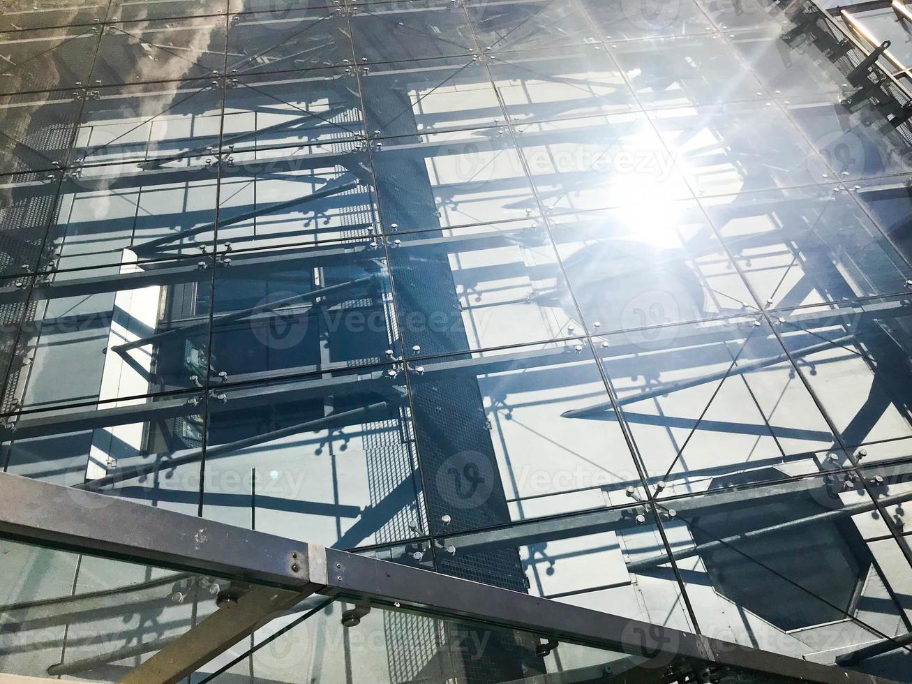 Texture of glass transparent sturdy roof of a skyscraper building. The background photo