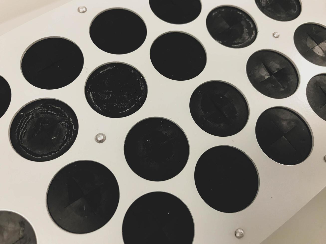 medical devices for performing analyzes. racks for holding blood tubes. a rack for rotating test tubes. small centrifuge for mixing blood clots photo