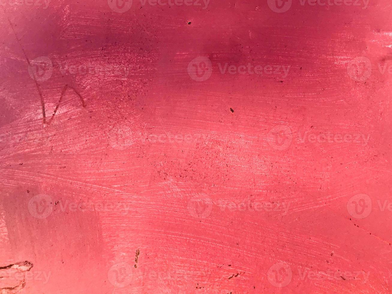 Texture metal iron red ragged scratched old painted with paint with embossed lines and stains. The background photo