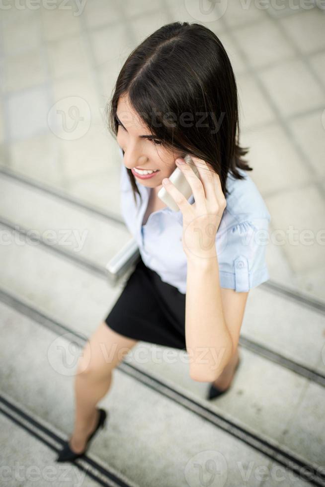 Businesswoman Using Mobile Phone photo