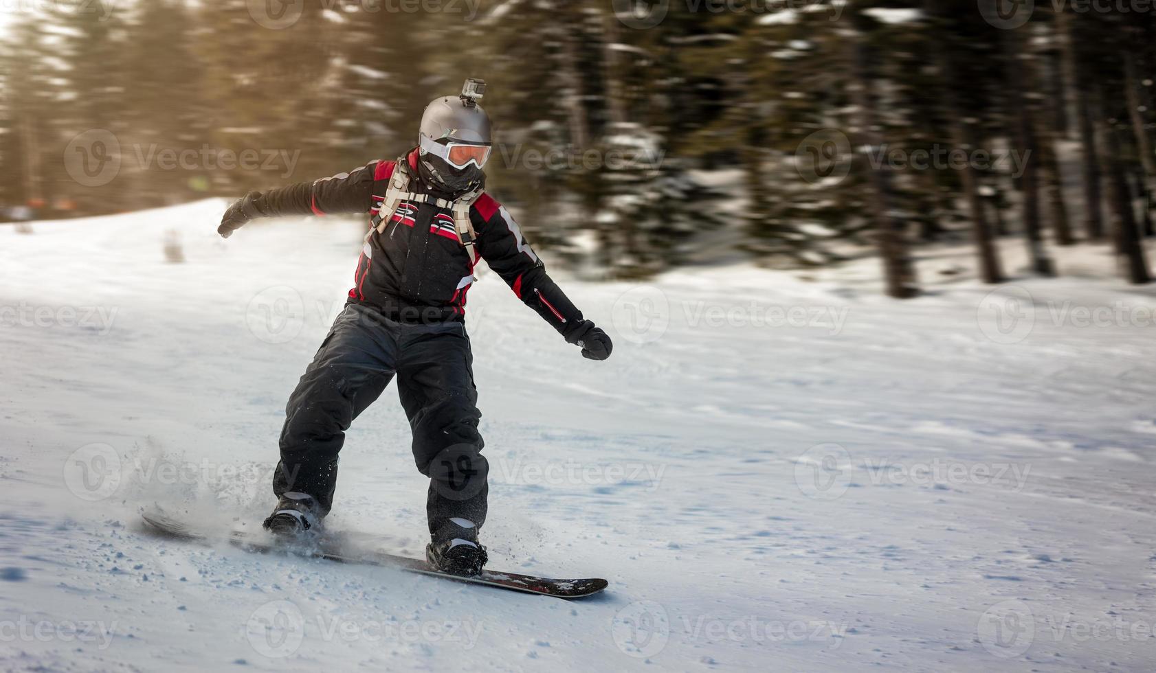 Snowboarder In Action photo