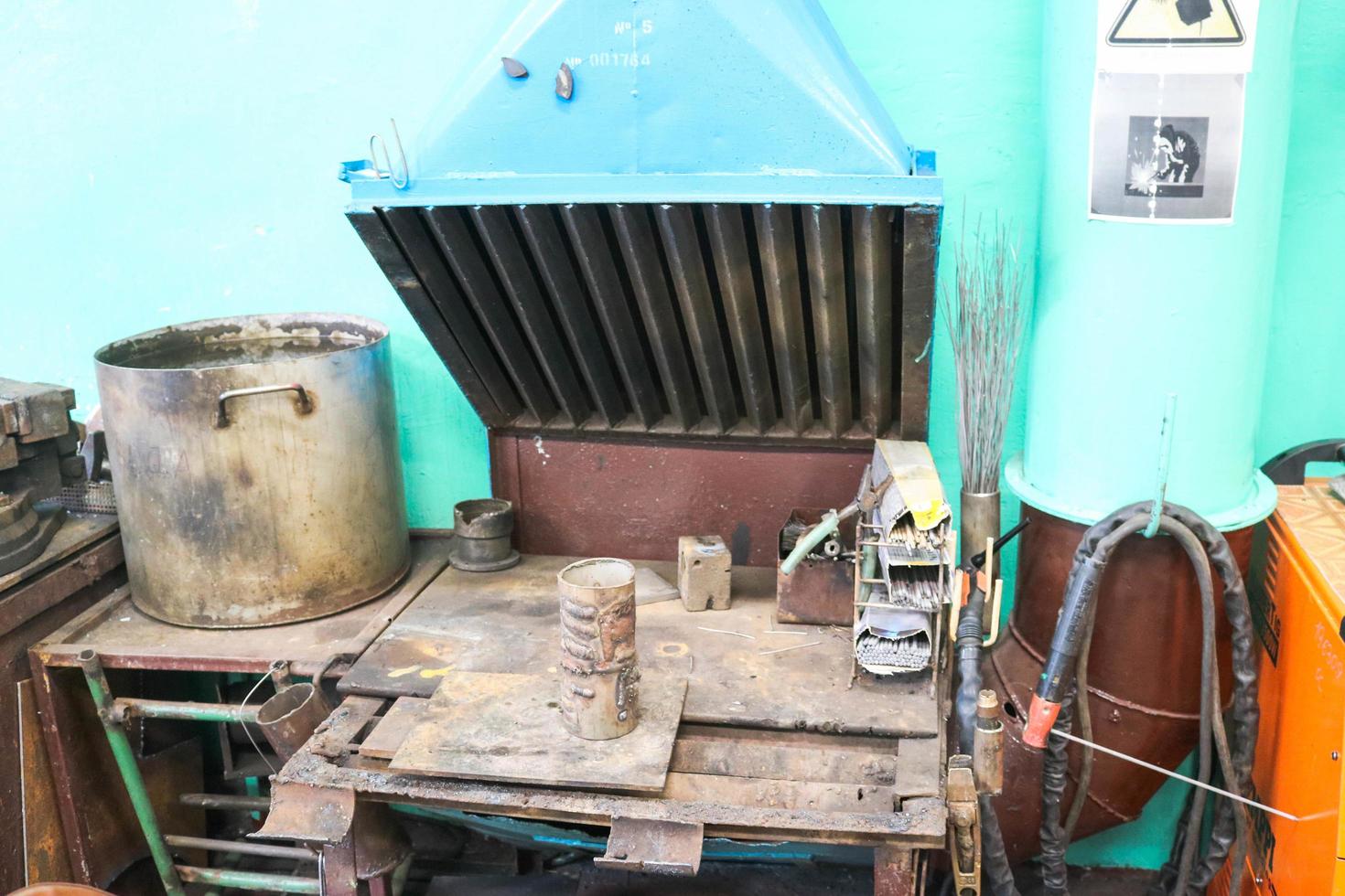 Welding post, table for work of a welder in a workshop at a metallurgical plant in a repair production photo