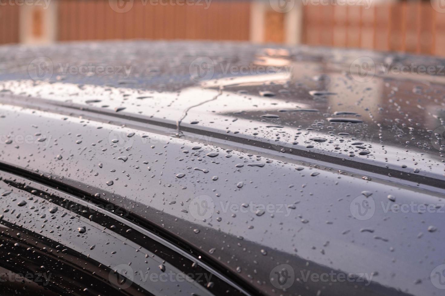 Car roof up view with water dropped. photo