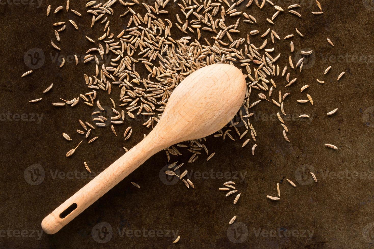 Cumin Seeds Spilled from a Spoon photo