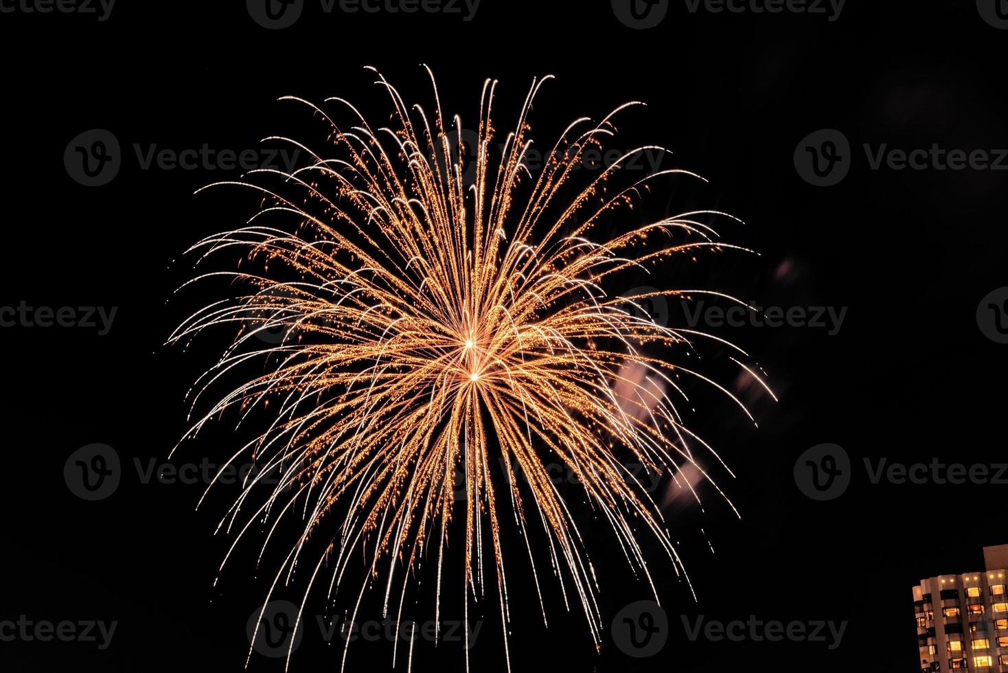 fireworks celebration on the river in the dark sky photo