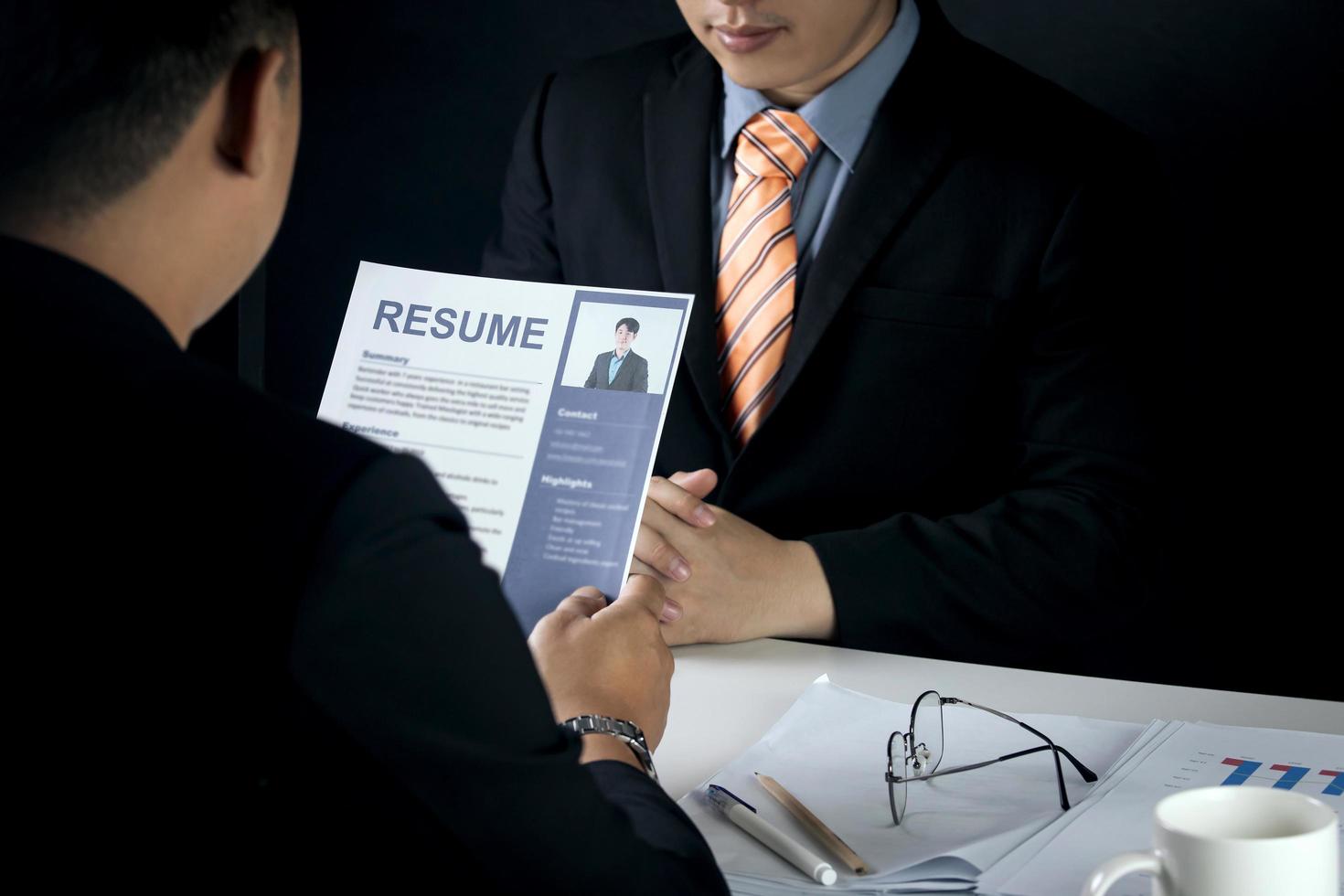 employer, management Interview for a job to hire someone to work for a company. HR check resume. candidate details, recruitment concepts, personnel management recruiting, and job interviews. photo