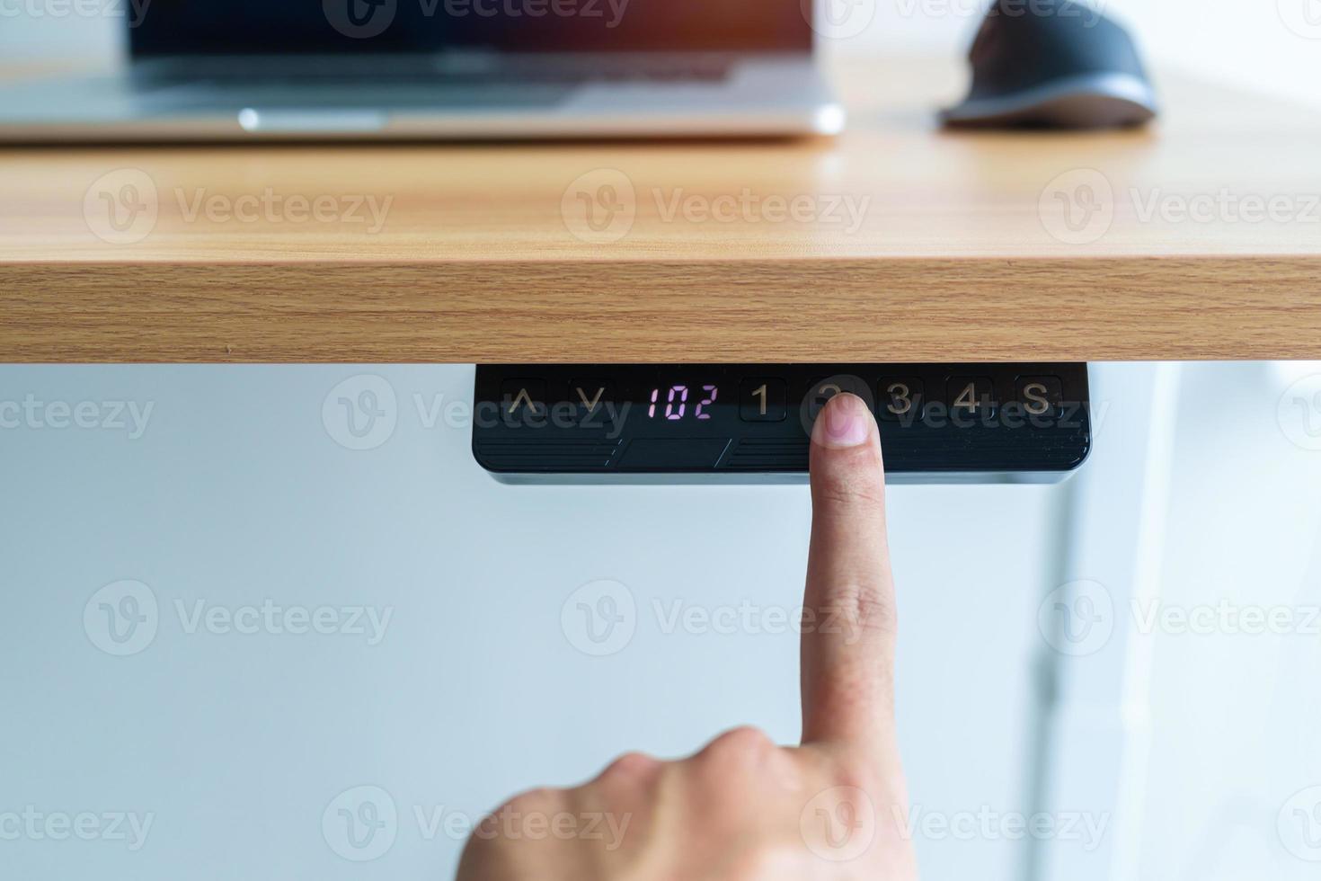 Hand adjustment Ergonomic electric desk or Adjustable height table when working long time for Good posture to avoid Office syndrome, Back Pain, shoulder ache, scapular, fibromyalgia, Neck, piriformis photo