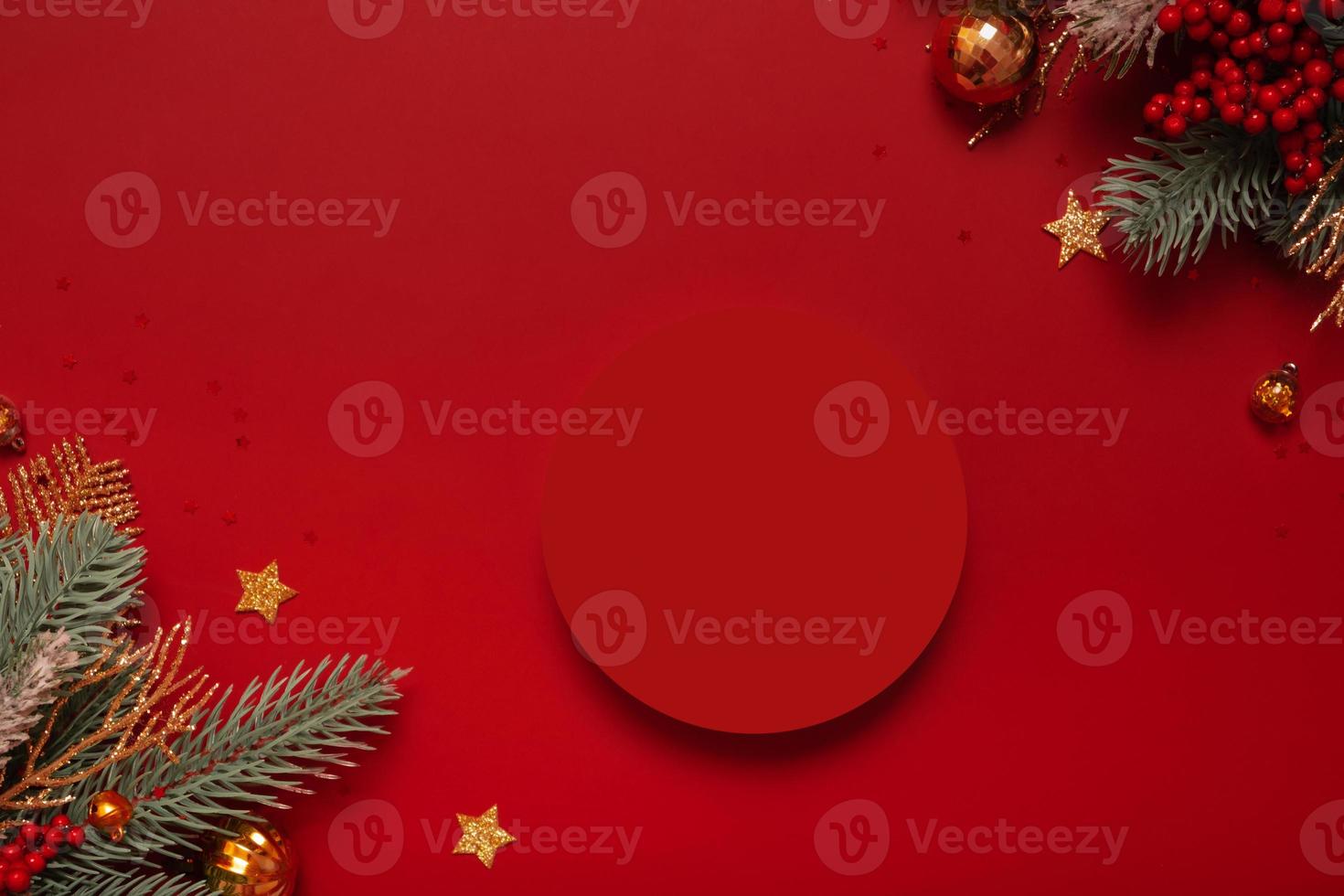 Mock up podium or pedestal for skincare beauty products and Christmas decorations top view on red background photo