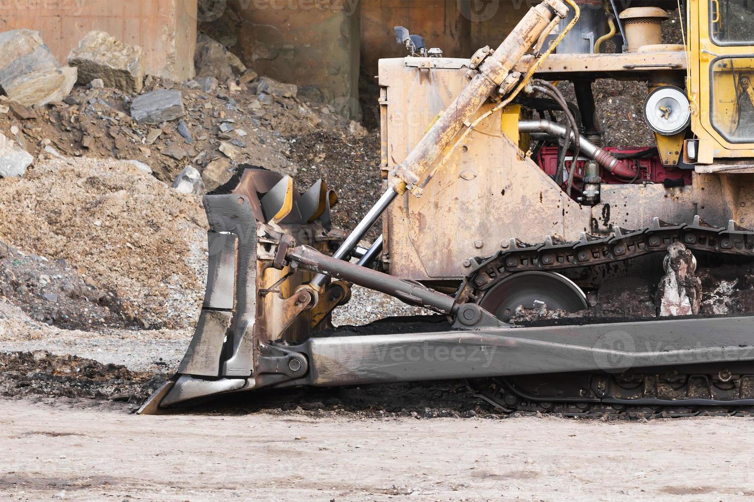 Bulldozer working in site photo