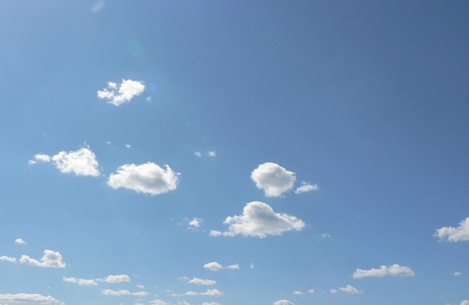 Beautiful blue sky with clouds background. Sky clouds. Air and fluffy clouds in the blue sky on a sunny day, background texture. Copy space. The concept of hope. photo