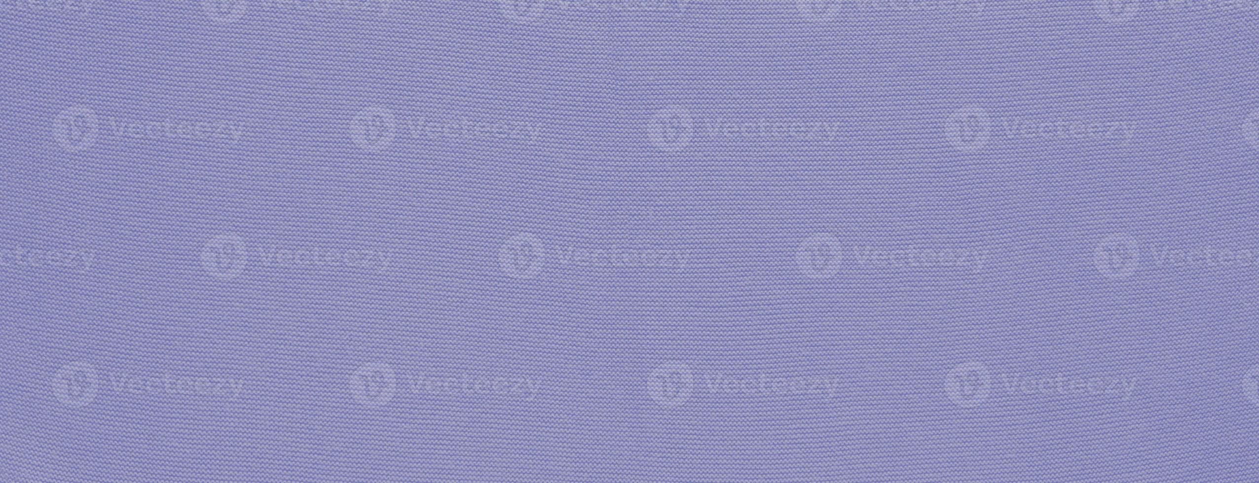 Texture of smooth knitted sweater with pattern. Handmade knitting wool or cotton fabric texture. Background of Large knit pattern with knitting needles or crochet. photo