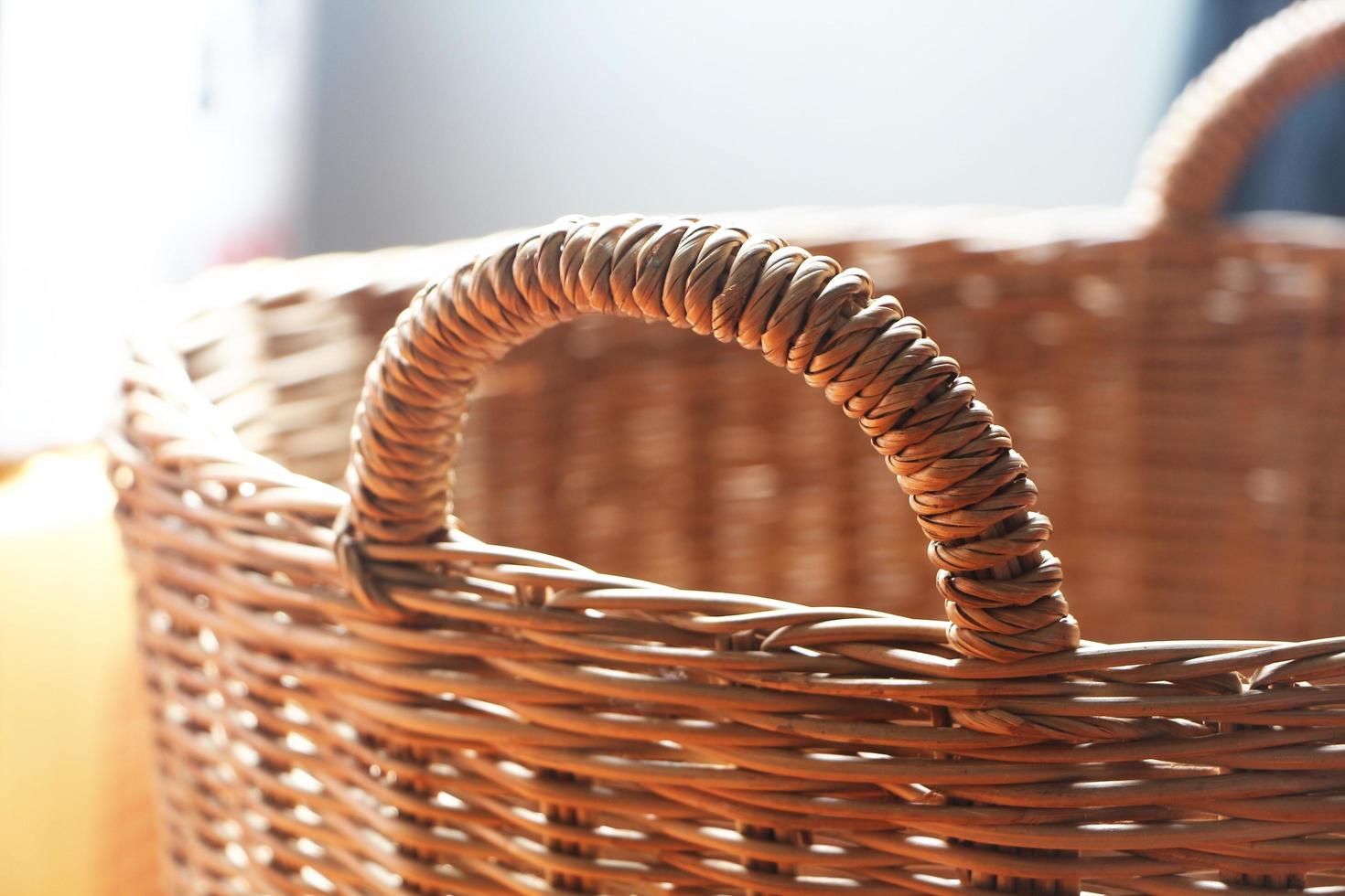 Handles of empty wicker basket. photo