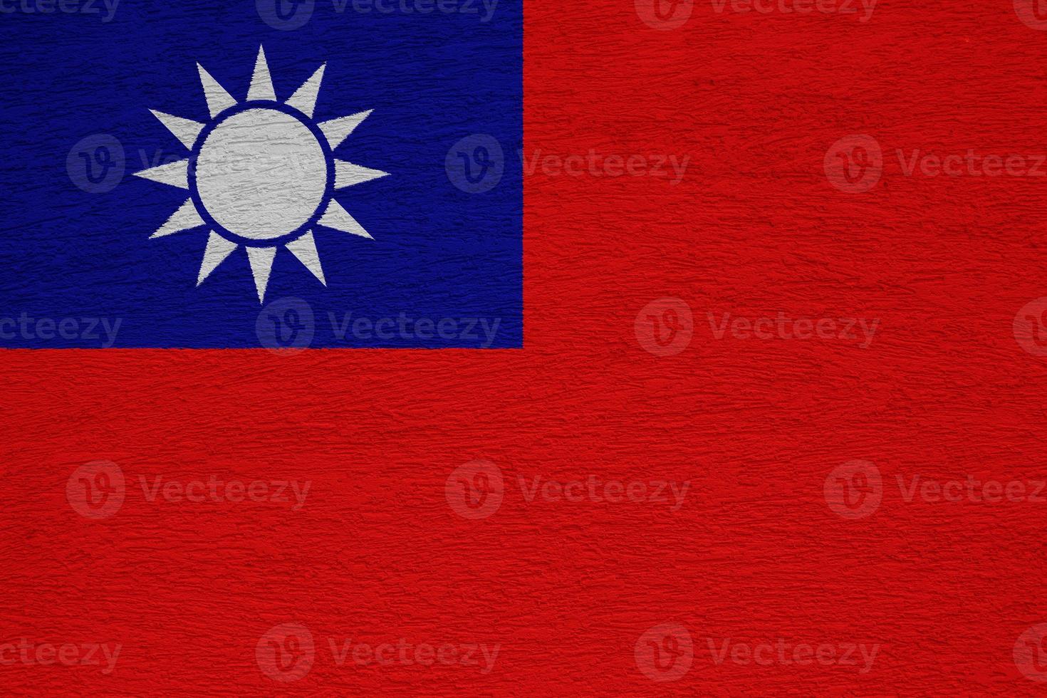 Taiwan flag on a textured background. Concept collage. photo