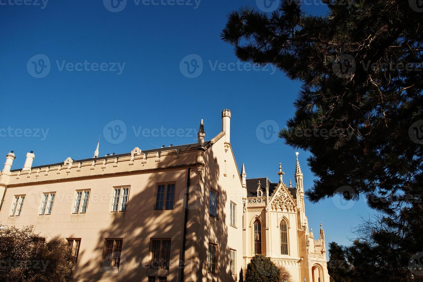 Lednice Castle Chateau on sunny autumn day in South Moravia, Czech Republic, Europe. photo