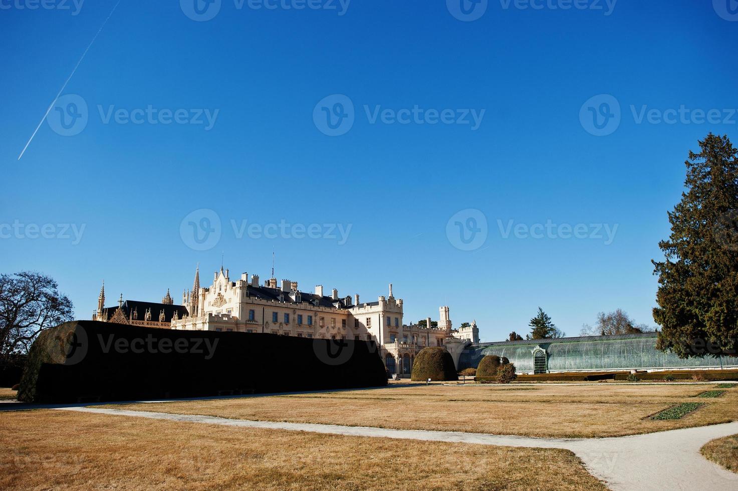 Lednice Castle Chateau with beautiful gardens and parks on sunny autumn day in South Moravia, Czech Republic, Europe. photo