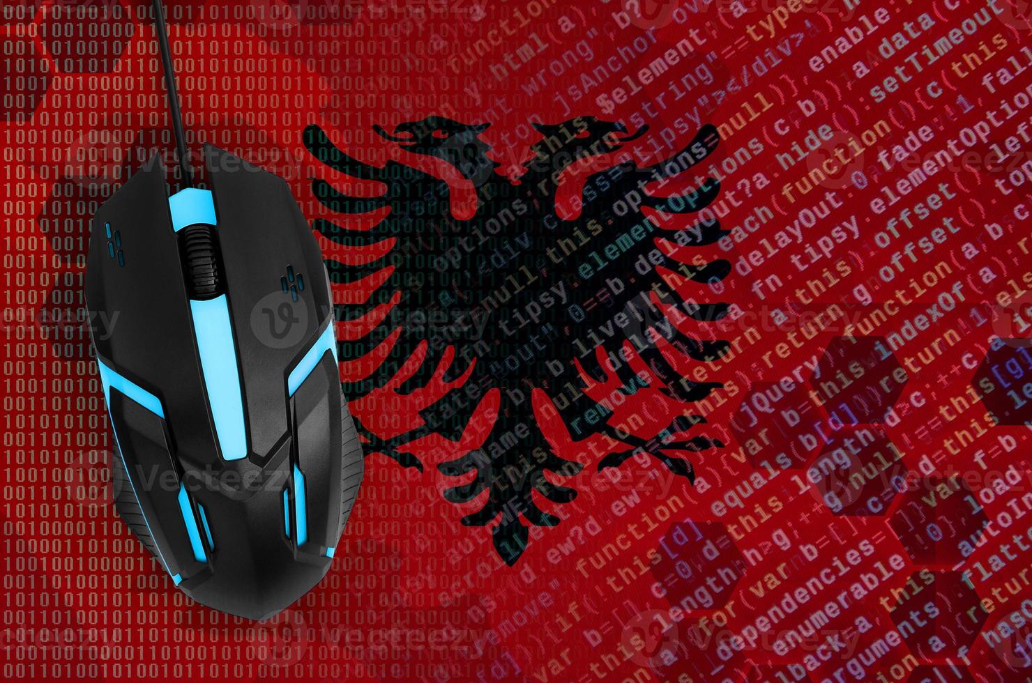Albania flag  and computer mouse. Digital threat, illegal actions on the Internet photo