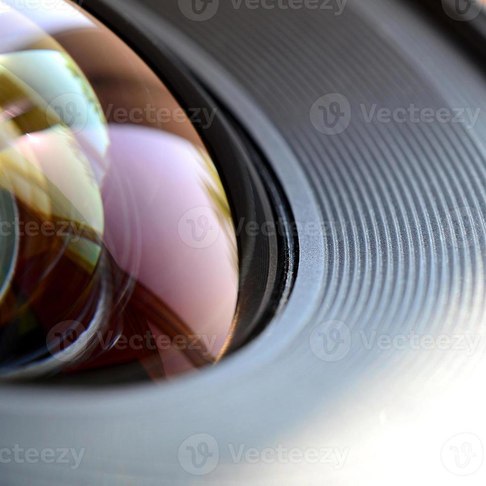 Photo Camera lens close up macro view. Concept of photographer or camera man job