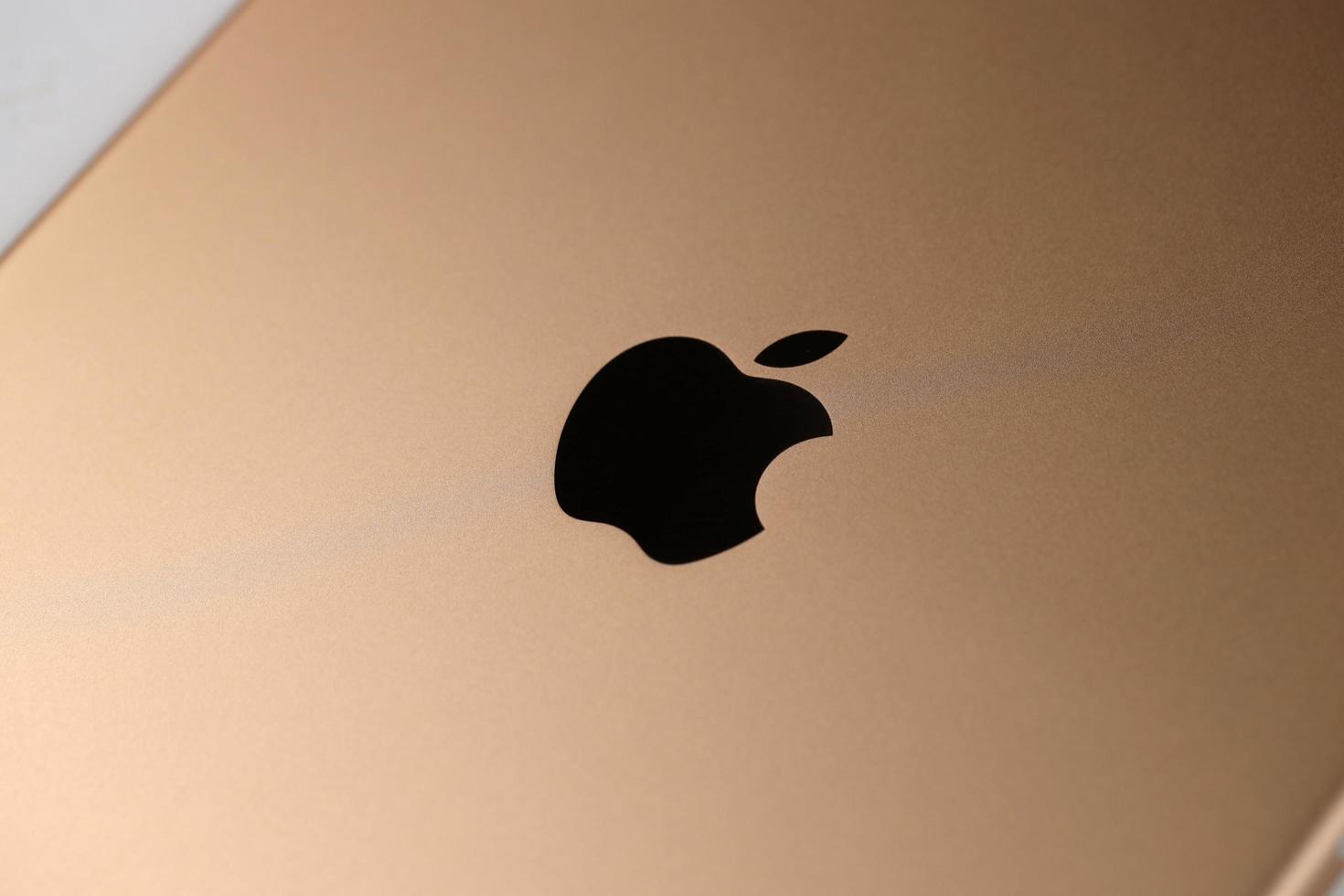 KHARKIV, UKRAINE - JANUARY 27, 2021 Brand new Apple iPad golden body surface with company logo. Apple Inc. is an American technology company photo