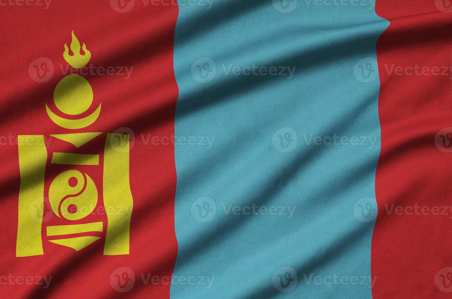 Mongolia flag  is depicted on a sports cloth fabric with many folds. Sport team banner photo