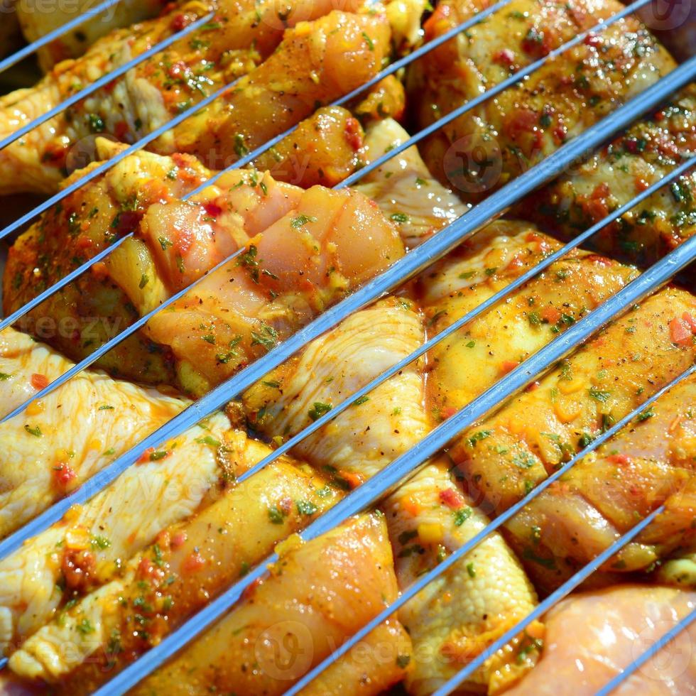 Marinated chicken legs on hot BBQ charcoal field grill 14188114 Stock