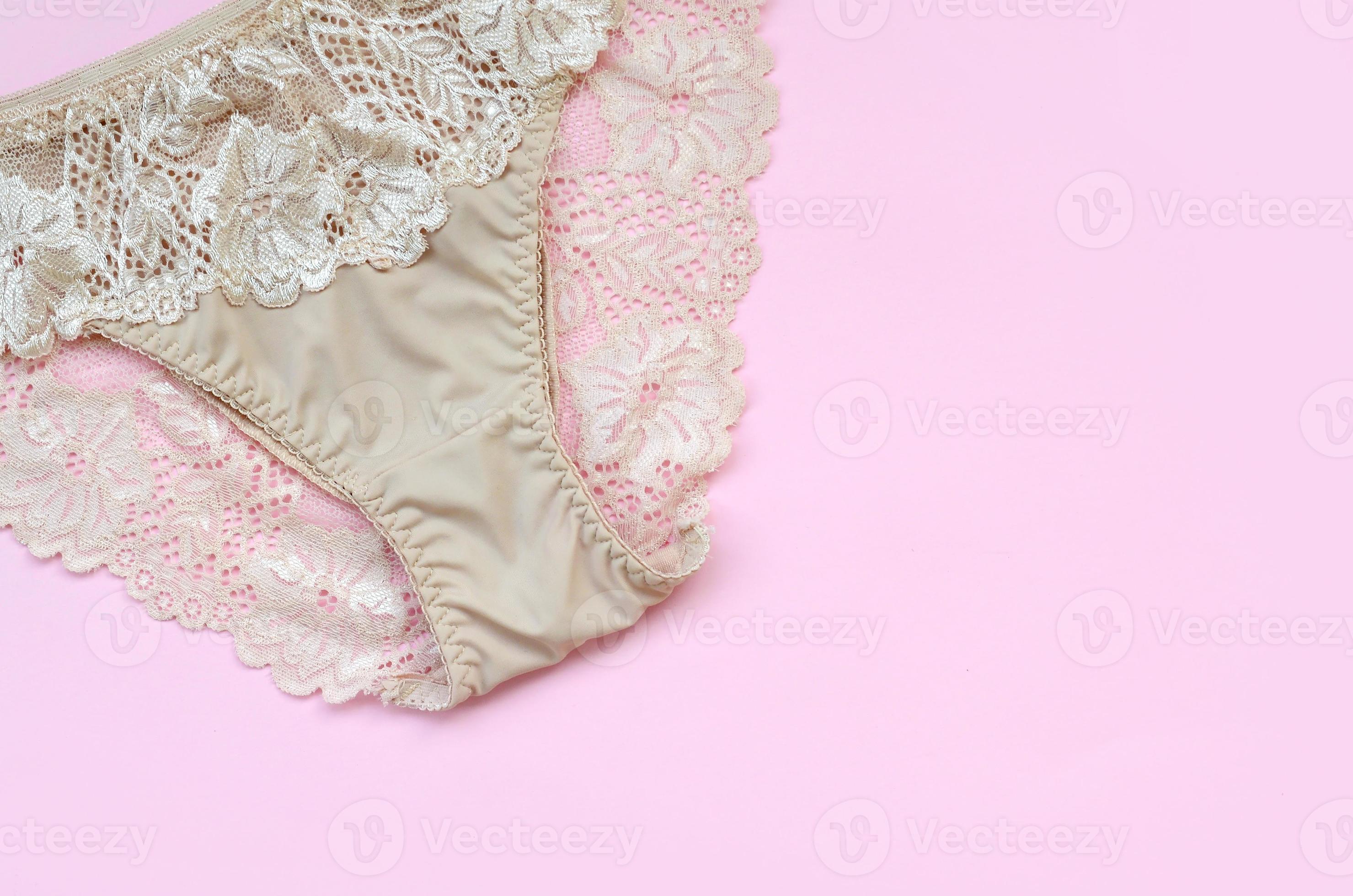 Beige women underwear with lace on pink background with copy space. Beauty  fashion blogger concept. Romantic lingerie for Valentines day temptation  14188235 Stock Photo at Vecteezy