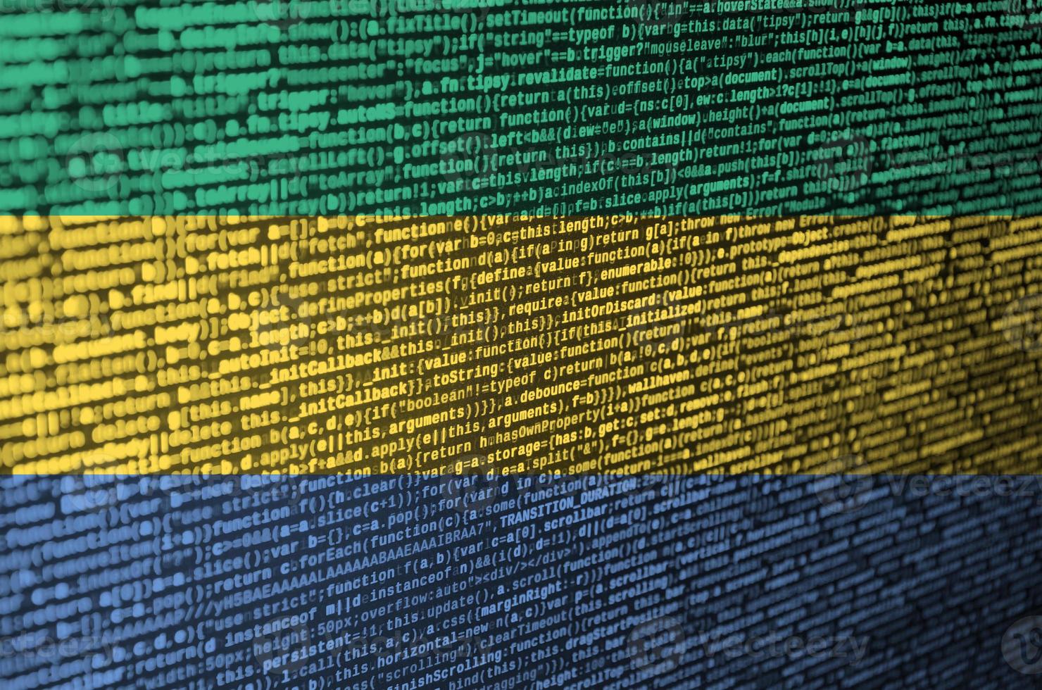 Gabon flag  is depicted on the screen with the program code. The concept of modern technology and site development photo
