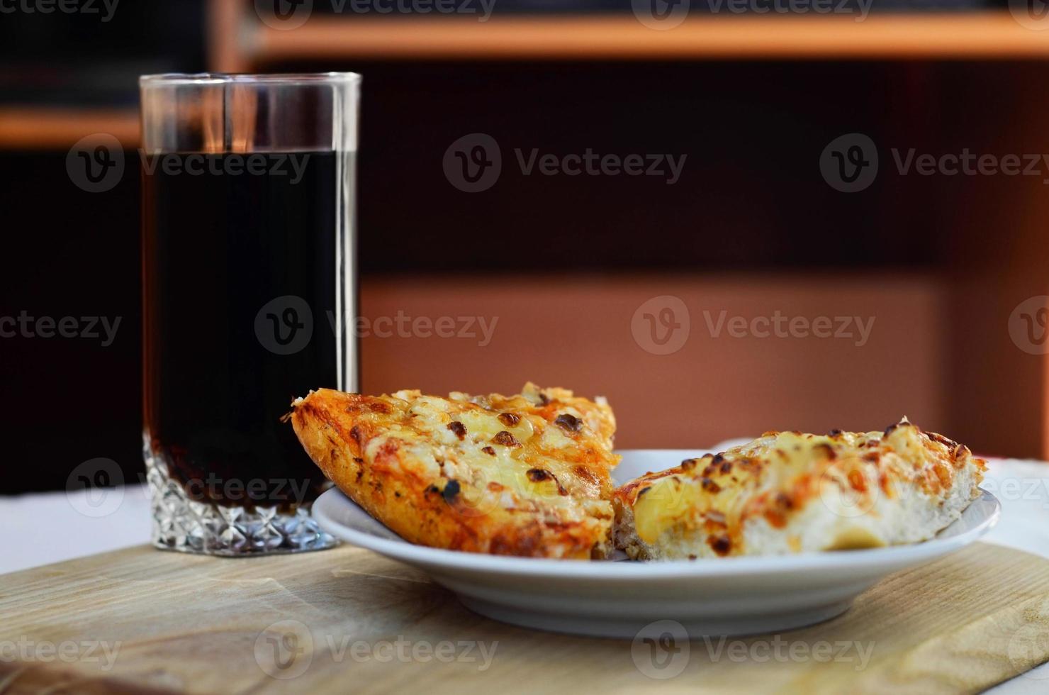 Hot pizza and cup of cola photo