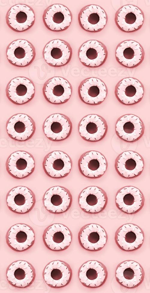 Many small plastic donuts lies on a pastel colorful background. Flat lay minimal pattern. Top view photo