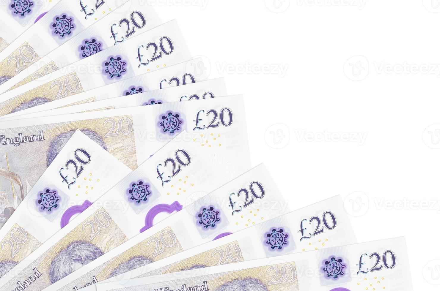 20 British pounds bills lies isolated on white background with copy space stacked in fan close up photo