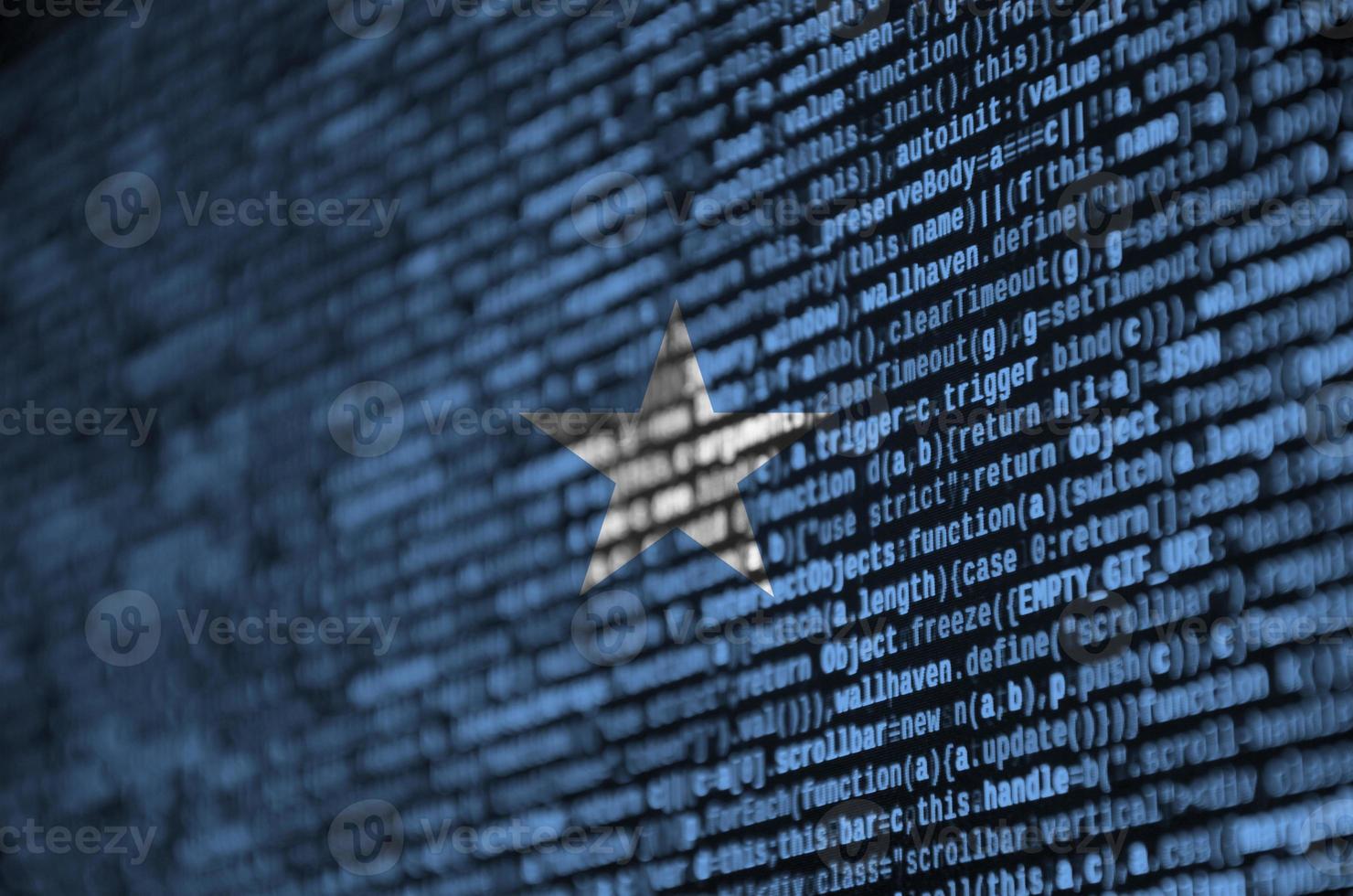 Somalia flag  is depicted on the screen with the program code. The concept of modern technology and site development photo