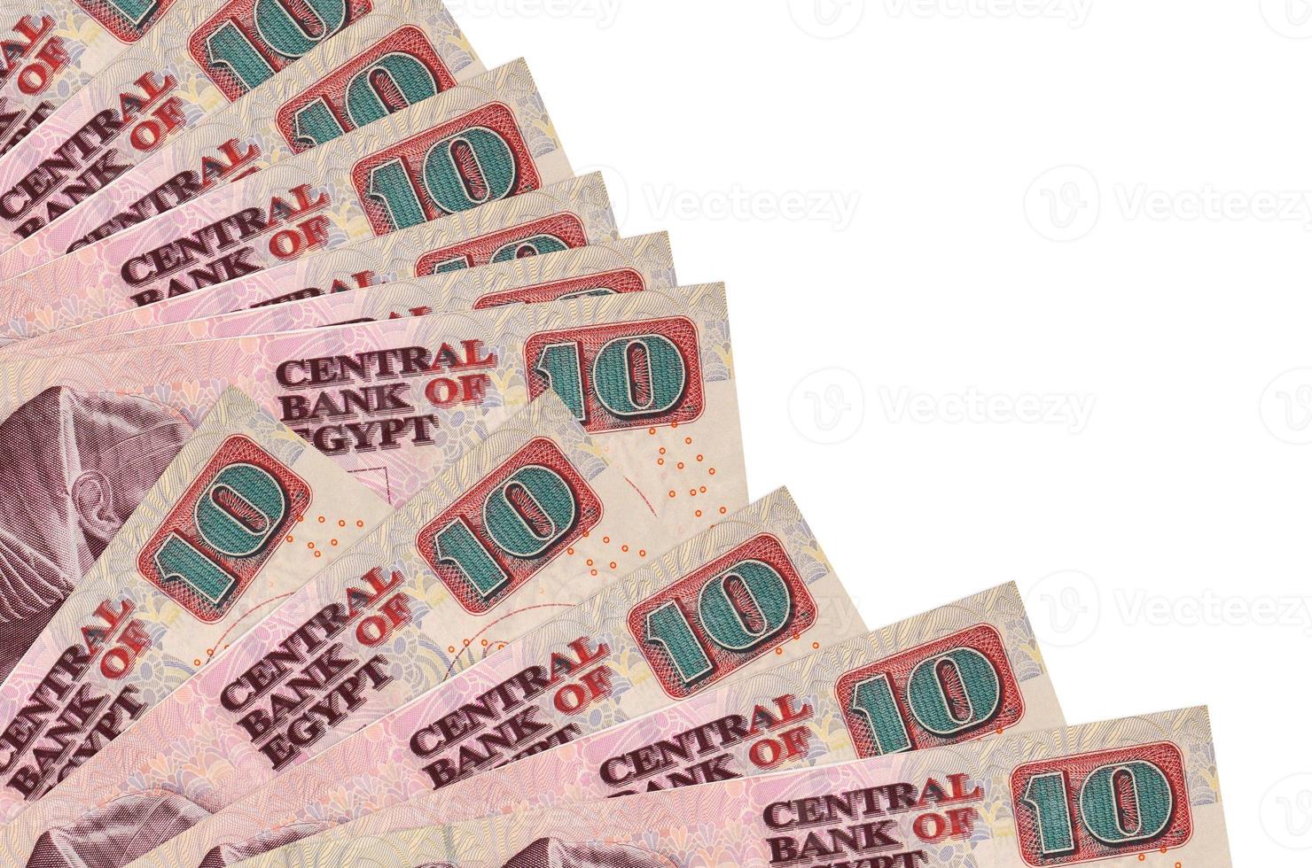 10 Egyptian pounds bills lies isolated on white background with copy space stacked in fan close up photo