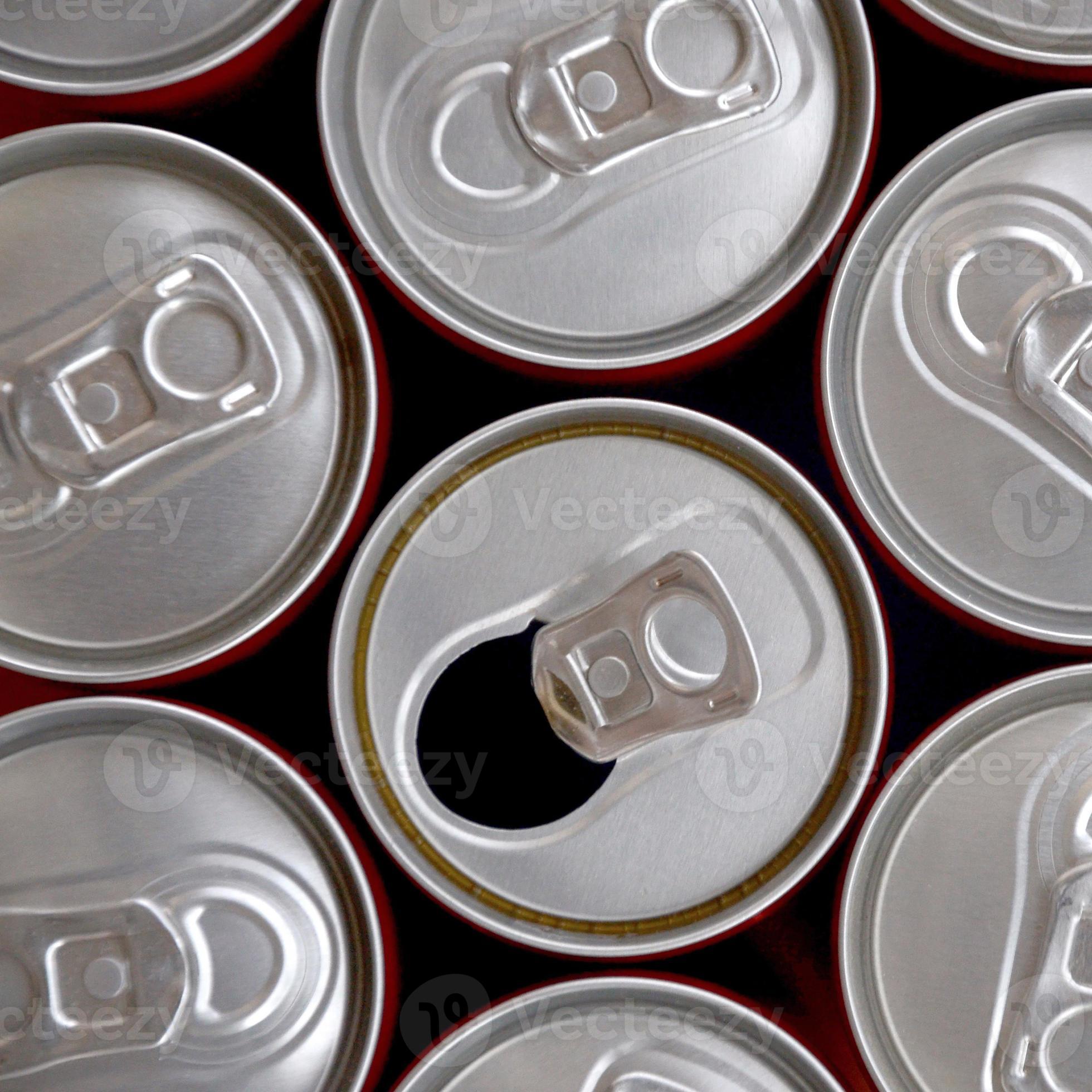 Many cans of soda soft drink or energy drink containers. A lot of