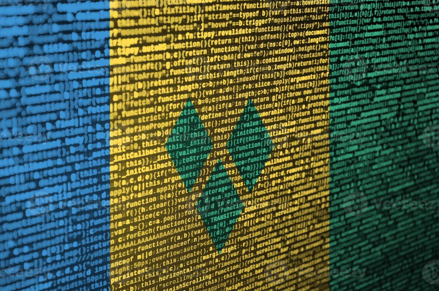 Saint Vincent and the Grenadines flag  is depicted on the screen with the program code. The concept of modern technology and site development photo
