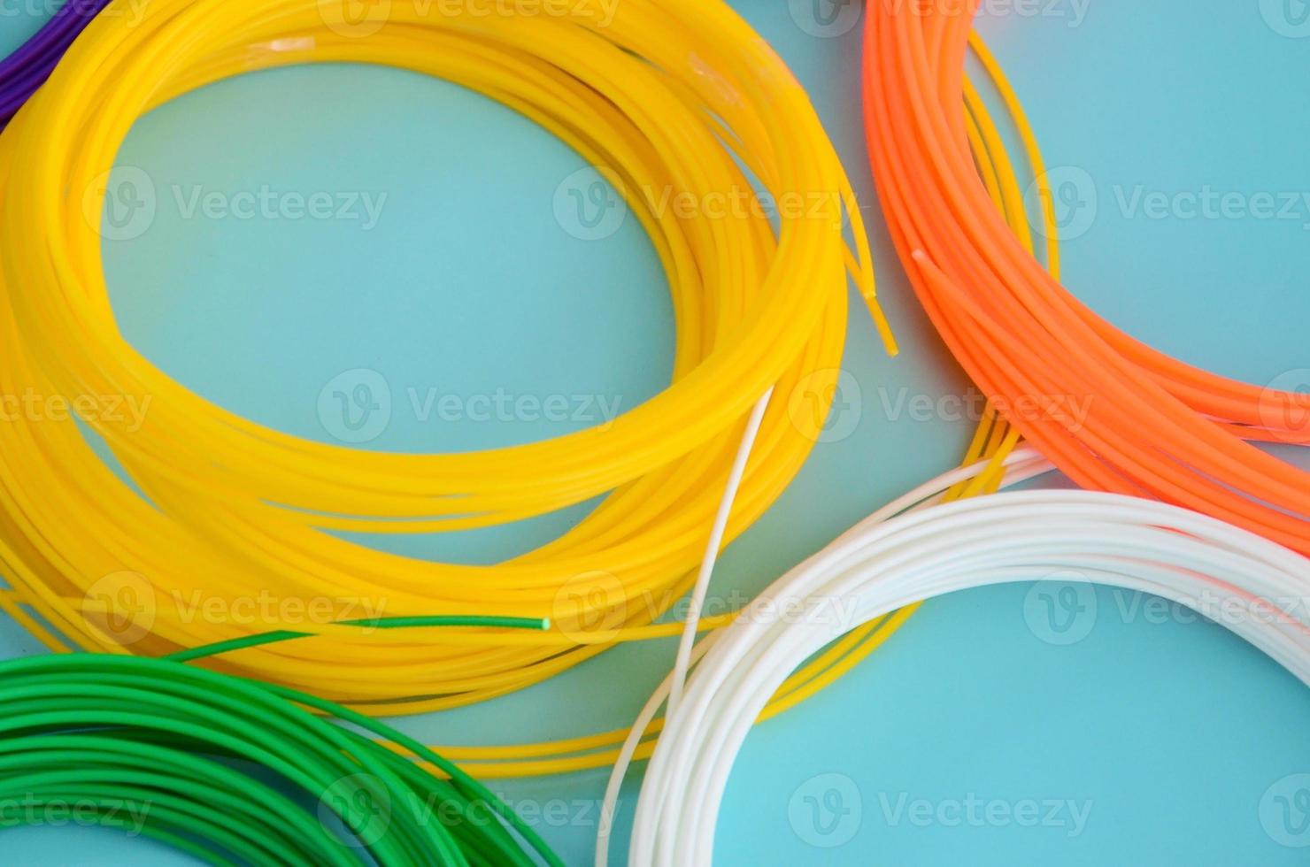 Plastic PLA and ABS filament material for printing on a 3D pen or printer of various colors photo