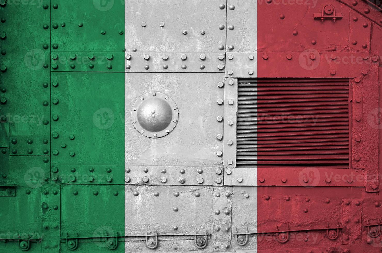 Italy flag depicted on side part of military armored tank closeup. Army forces conceptual background photo