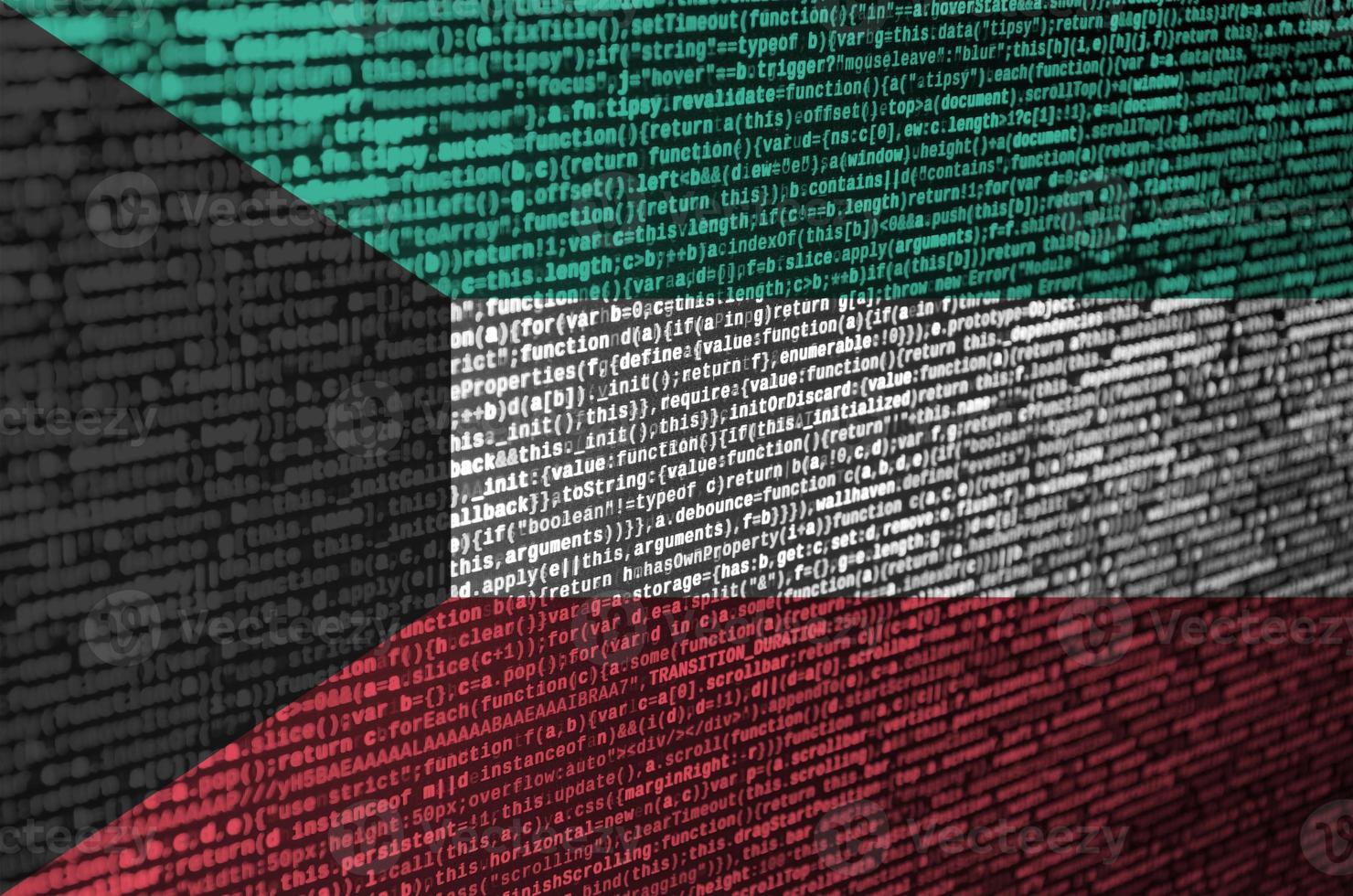 Kuwait flag  is depicted on the screen with the program code. The concept of modern technology and site development photo