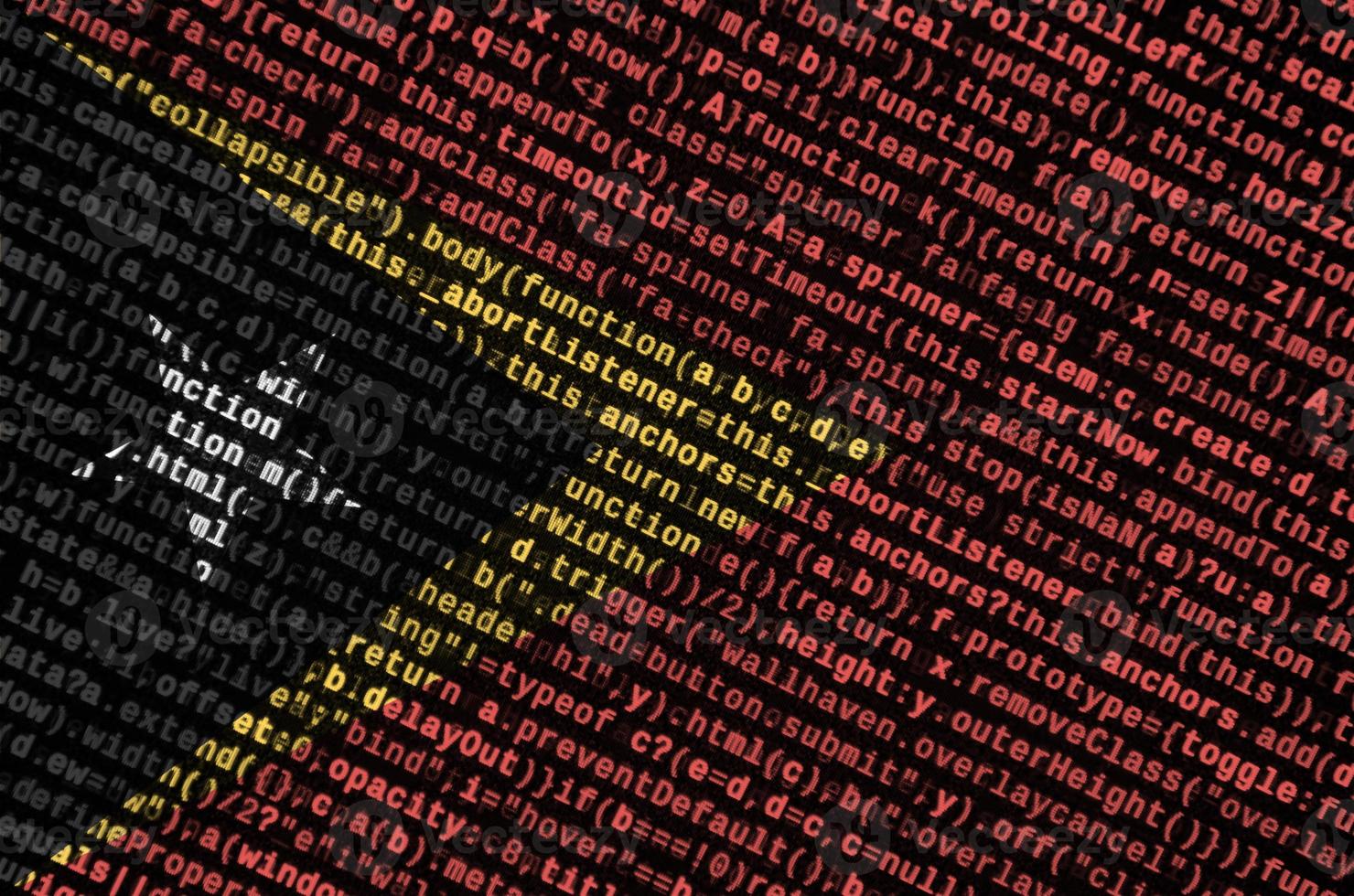 Timor Leste flag  is depicted on the screen with the program code. The concept of modern technology and site development photo